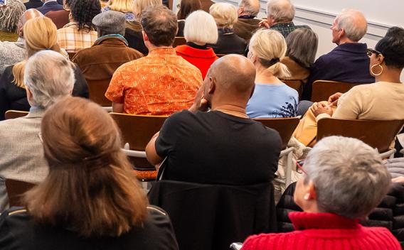 Audience facing away from camera