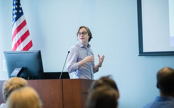 Records liaison addressing a room